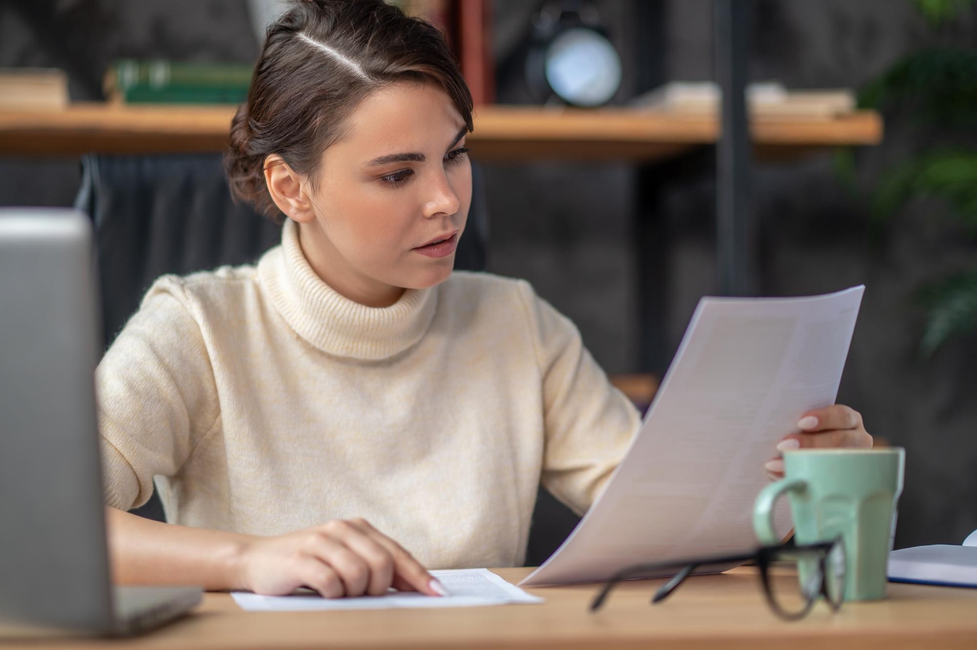 Best Universities in Toronto in 2026-2027, and Exactly How to Apply 4 Student reviewing application portal on a laptop