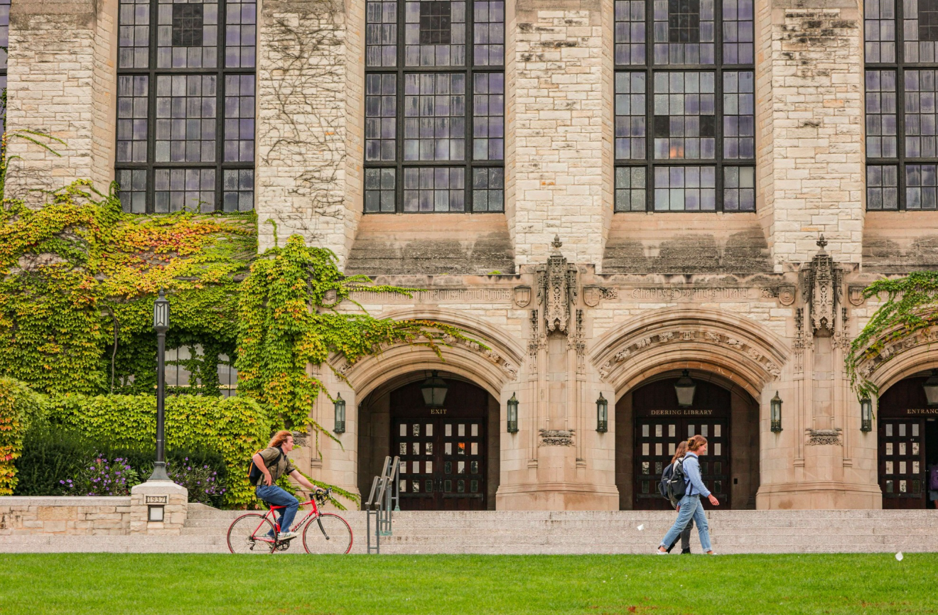 Best Universities in Toronto in 2026-2027, and Exactly How to Apply 3 Students walking on a university campus quad in autumn